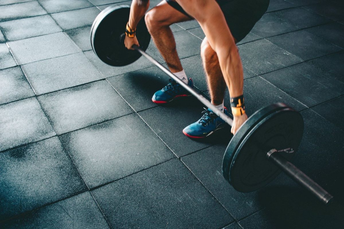 Man performing a barbell deadlift