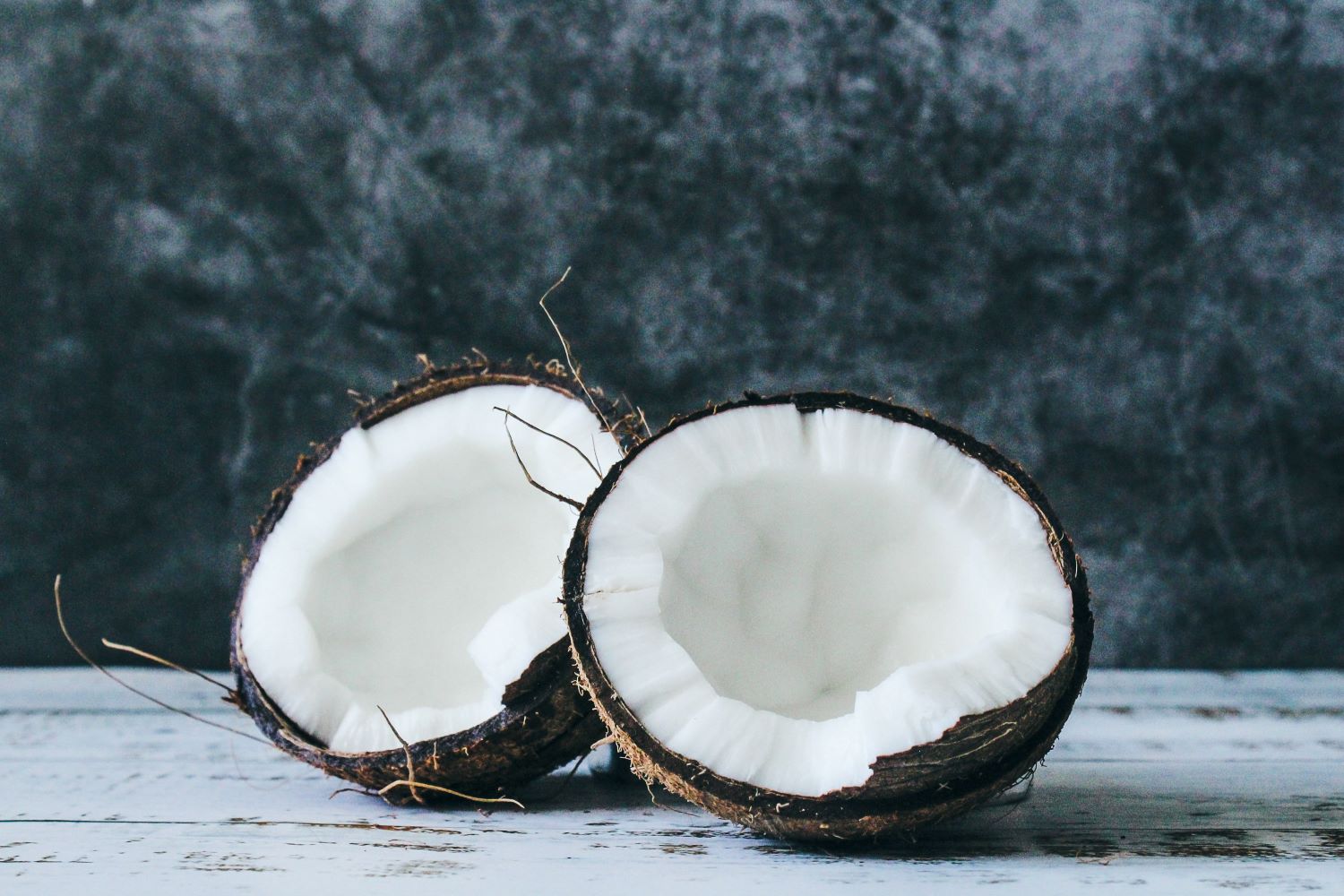 Coconut sliced in half